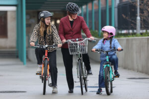 NTA Anne Graham on bike by 2 children on bicyles bikeweek