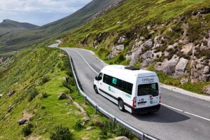 TFI Anseo App TFI Local link bus in a country road Achill